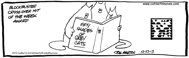 cats reading a book